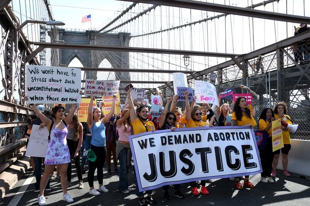 protesters on Tuesday morning marching in response to the leaked Supreme Court opinion about abortion rights
